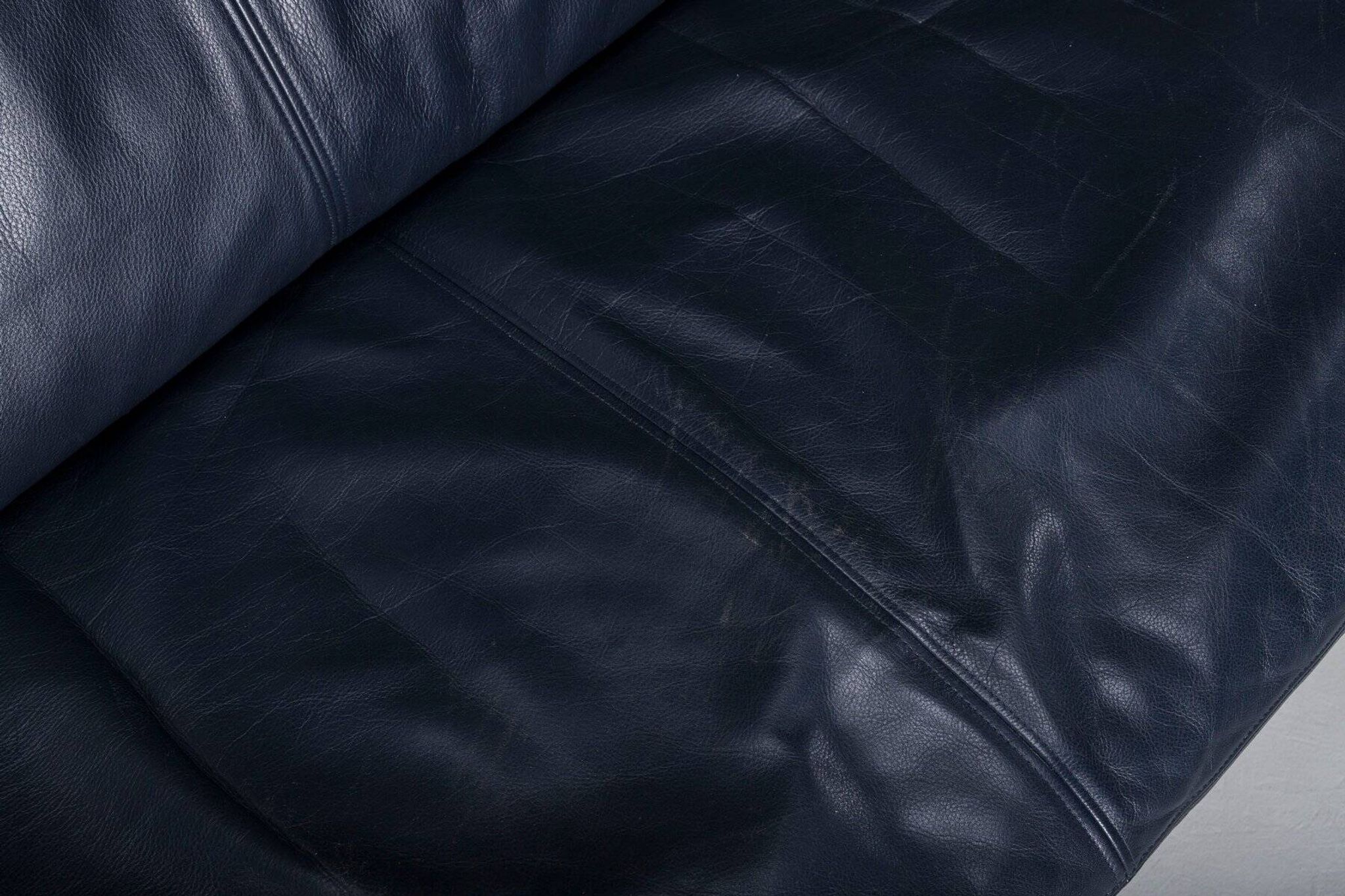 Danish teak and navy blue leather 3-seater sofa from Komfort, 1970s
