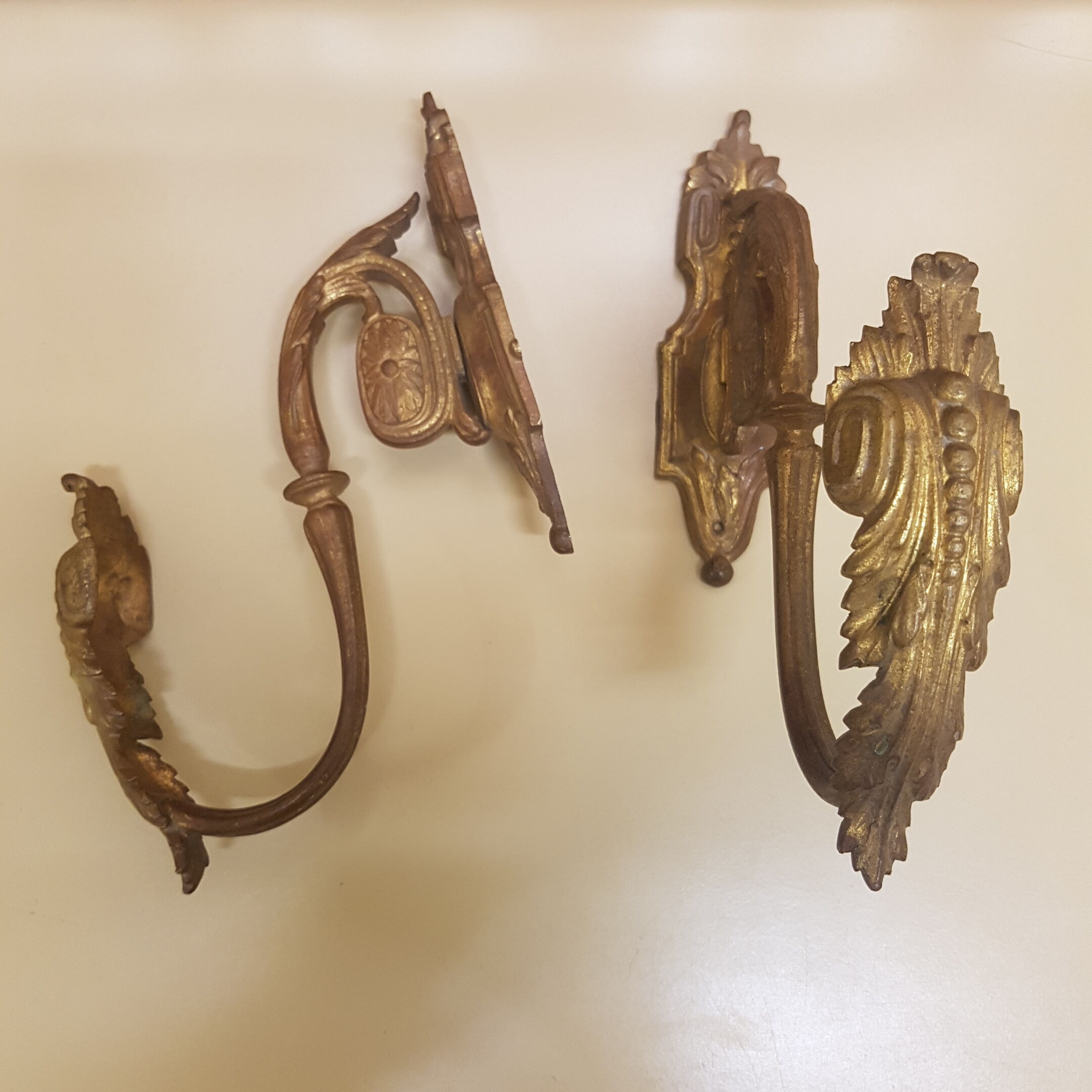 Pair of gilt bronze pegs