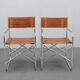 1970s pair of Italian folding chairs with leatherette upholstery