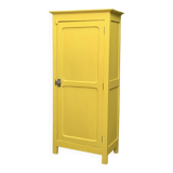 Armoire parisienne bonnetière ancienne jaune poudré.