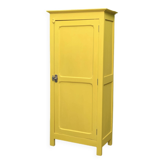 Antique powder yellow Parisian bonnetière wardrobe.