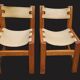 Pair of elm and leather chairs by Maison Regain