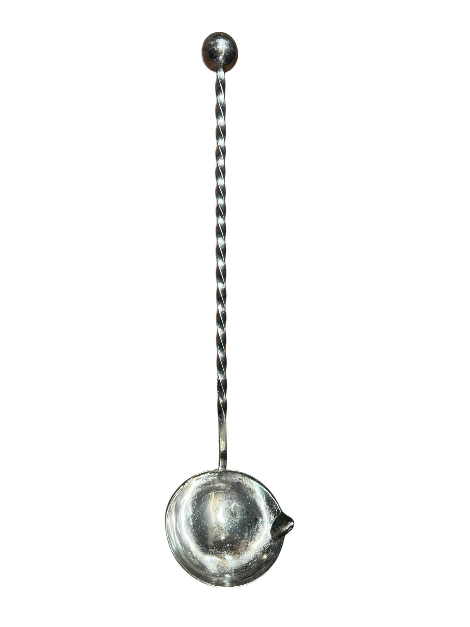 Silver metal ladle