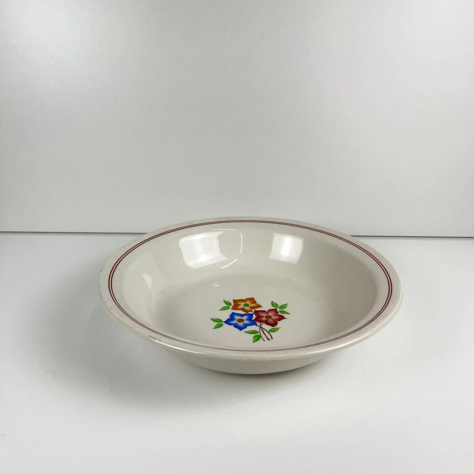 Round plate with rim "The Hive", Moulins des Loups, 20th century