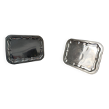 2 rectangular silver-plated metal dishes with an 80s pattern.