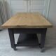 Coffee table on casters made from a vintage table, 1 drawer, 1 slate gray shelf.