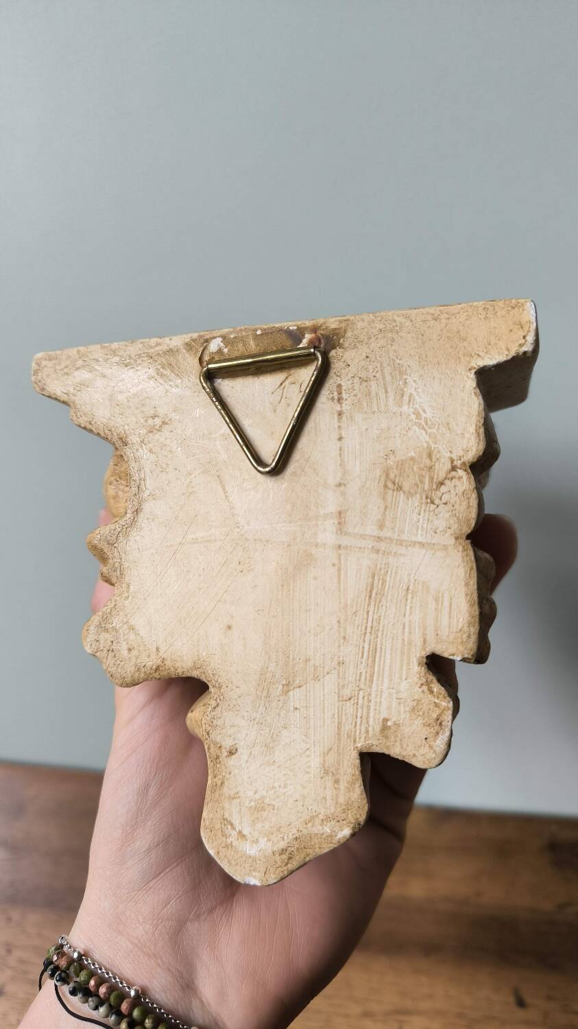 Small wall console shelf in vintage patinated plaster with baroque foliage