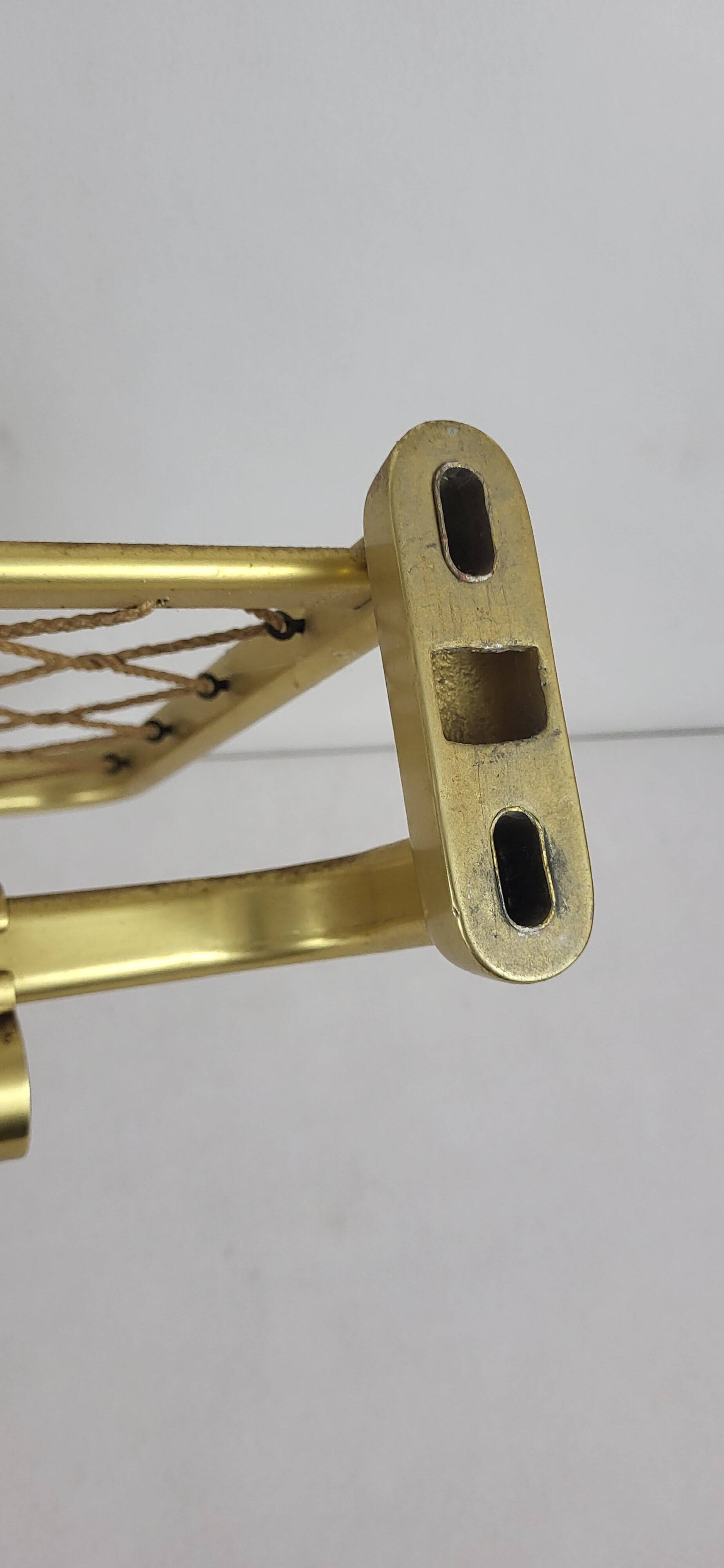 1960s gold aluminum coat rack