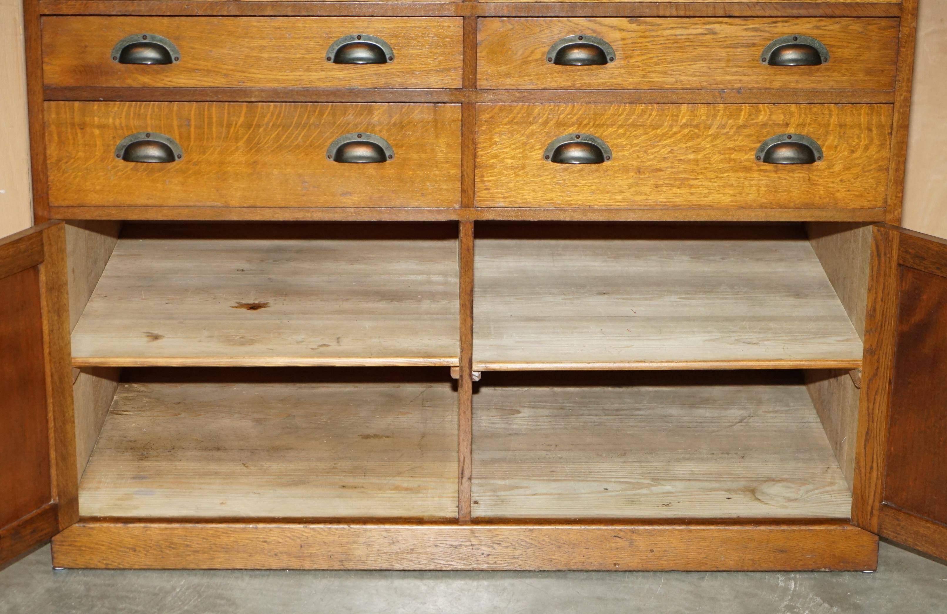 Antique English Art Deco furniture in hand-carved oak, 26 drawers.
