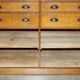 Antique English Art Deco furniture in hand-carved oak, 26 drawers.
