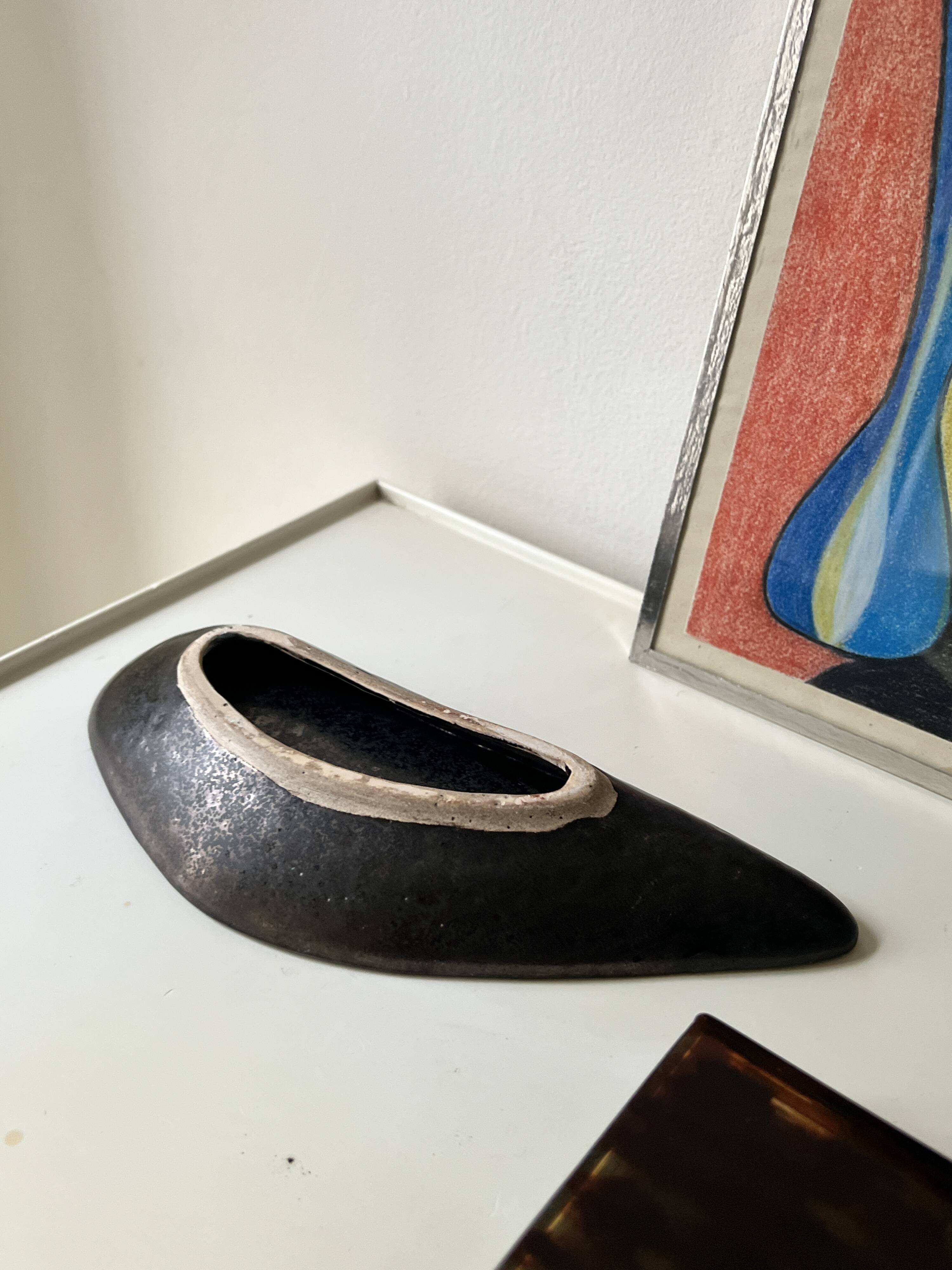 Black glazed ceramic catchall, 1950s design