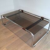Coffee table in chrome, leather, and smoked glass