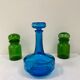 Vintage turquoise blue glass vase/decanter