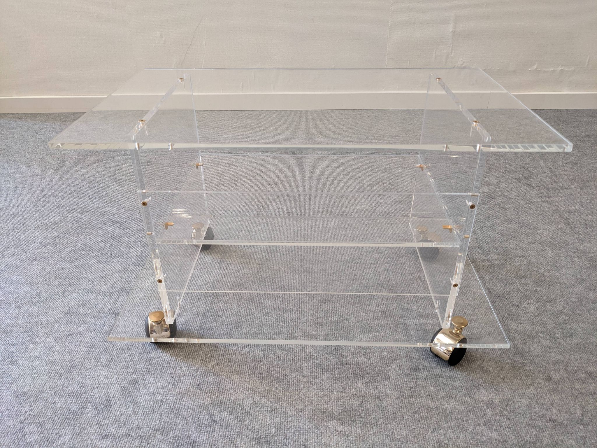 David Lange side table on wheels in plexiglass, France 1970.