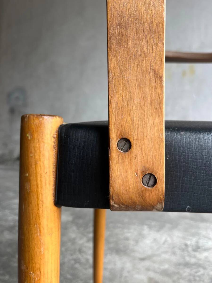 Set of 2 vintage beech wood armchairs with black skai upholstery — mid-century modern