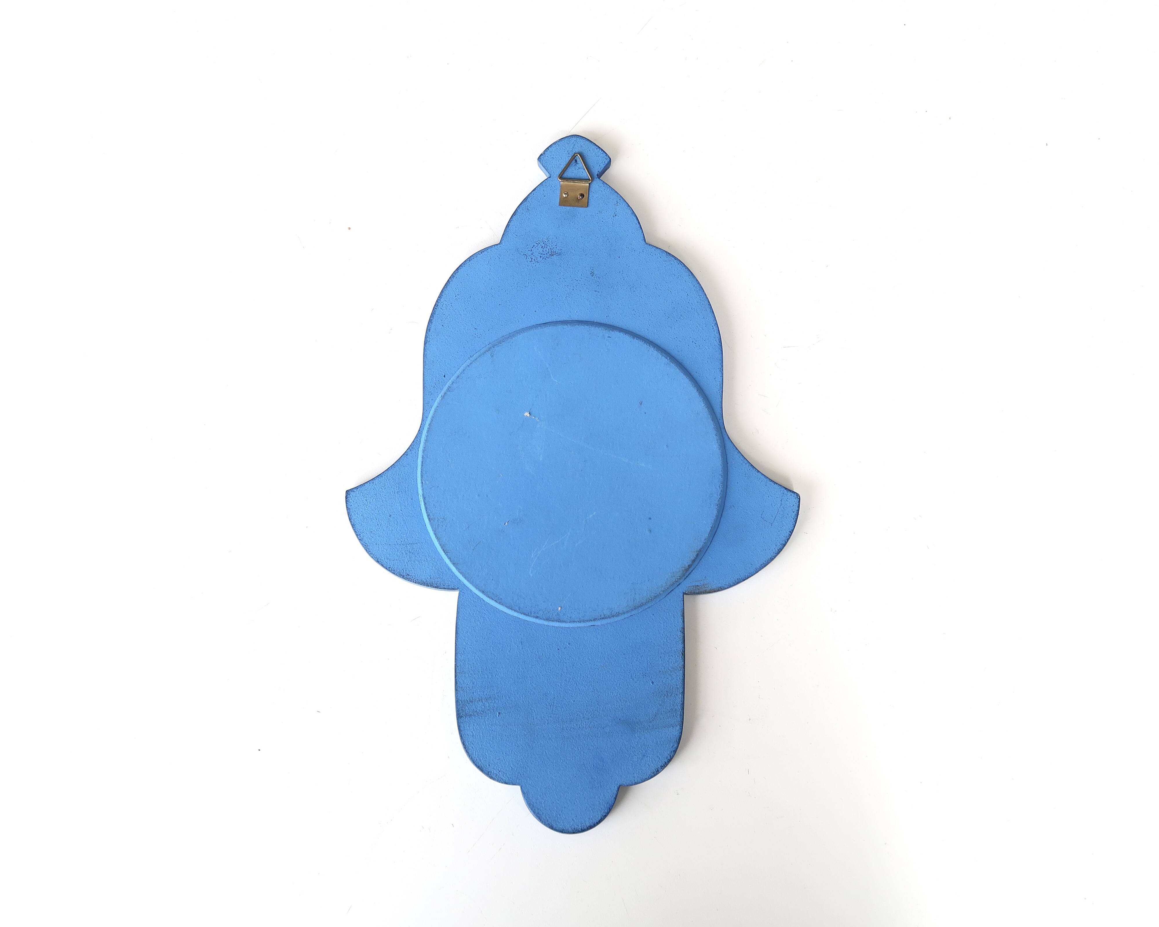 Moroccan painted wooden mirror in the shape of a hand, 1970s