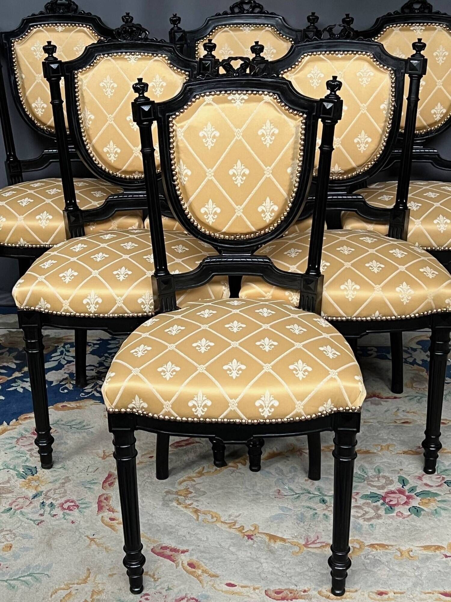 Dining room set consisting of a table and six chairs from the Napoleon III period.