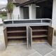 Grey lacquered wooden bar cabinet, golden brass bar