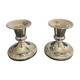 Pair of vintage candle holders in silver metal
