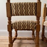 Pair of wooden chairs with herringbone fabric