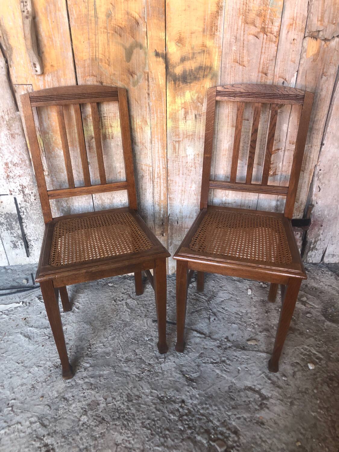 Pair of art deco chairs in wood & cane seat