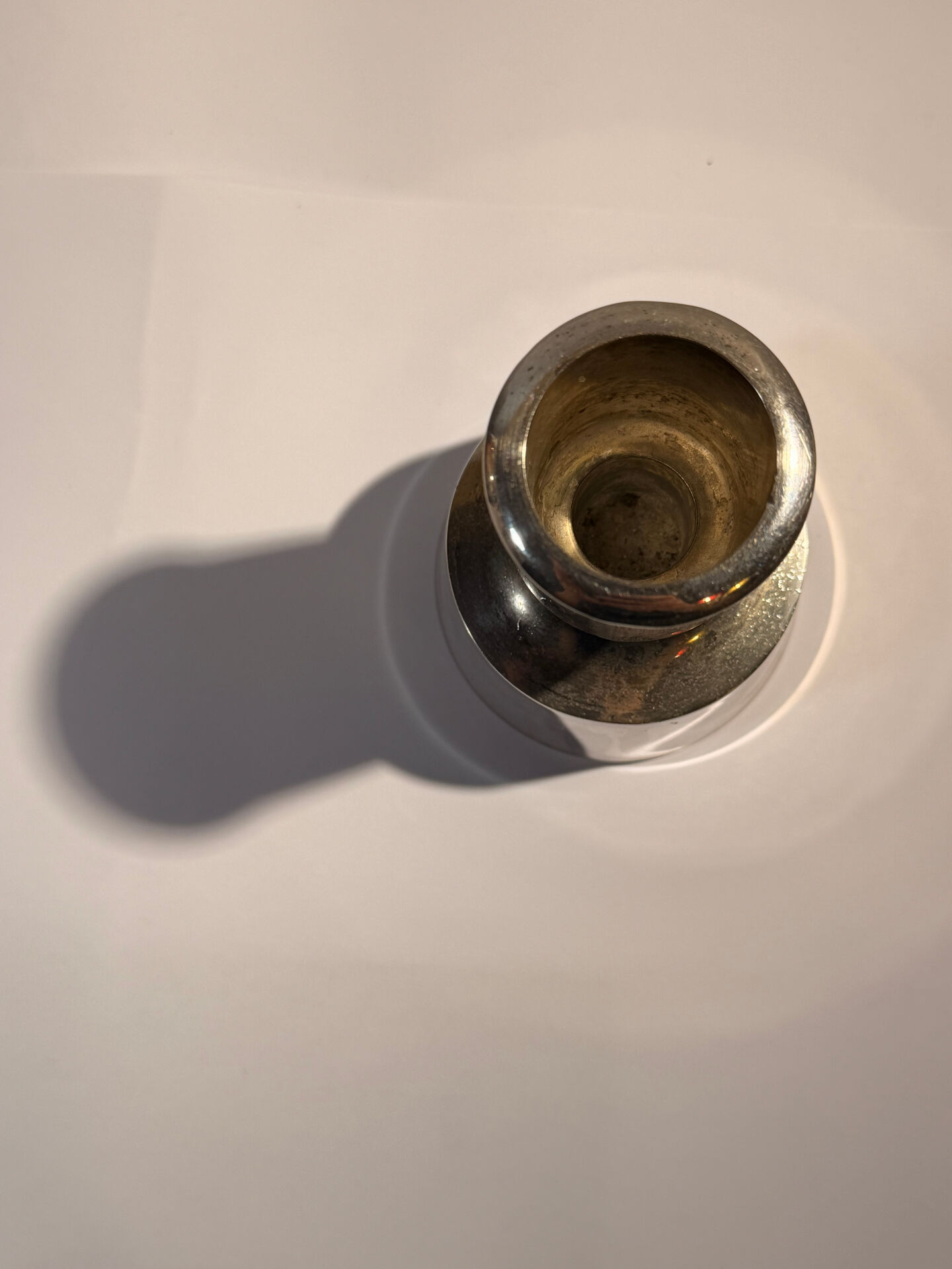 Metal candlestick by Jens Quistgaard for the brand Dansk Designs.