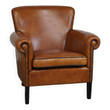 Fauteuil en cuir de mouton à l'aspect luxueux
