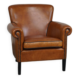 Fauteuil en cuir de mouton à l'aspect luxueux