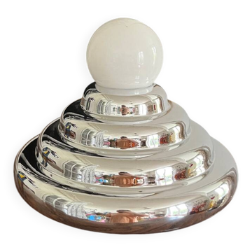 Table lamp, Axel Chay wall light in chrome.