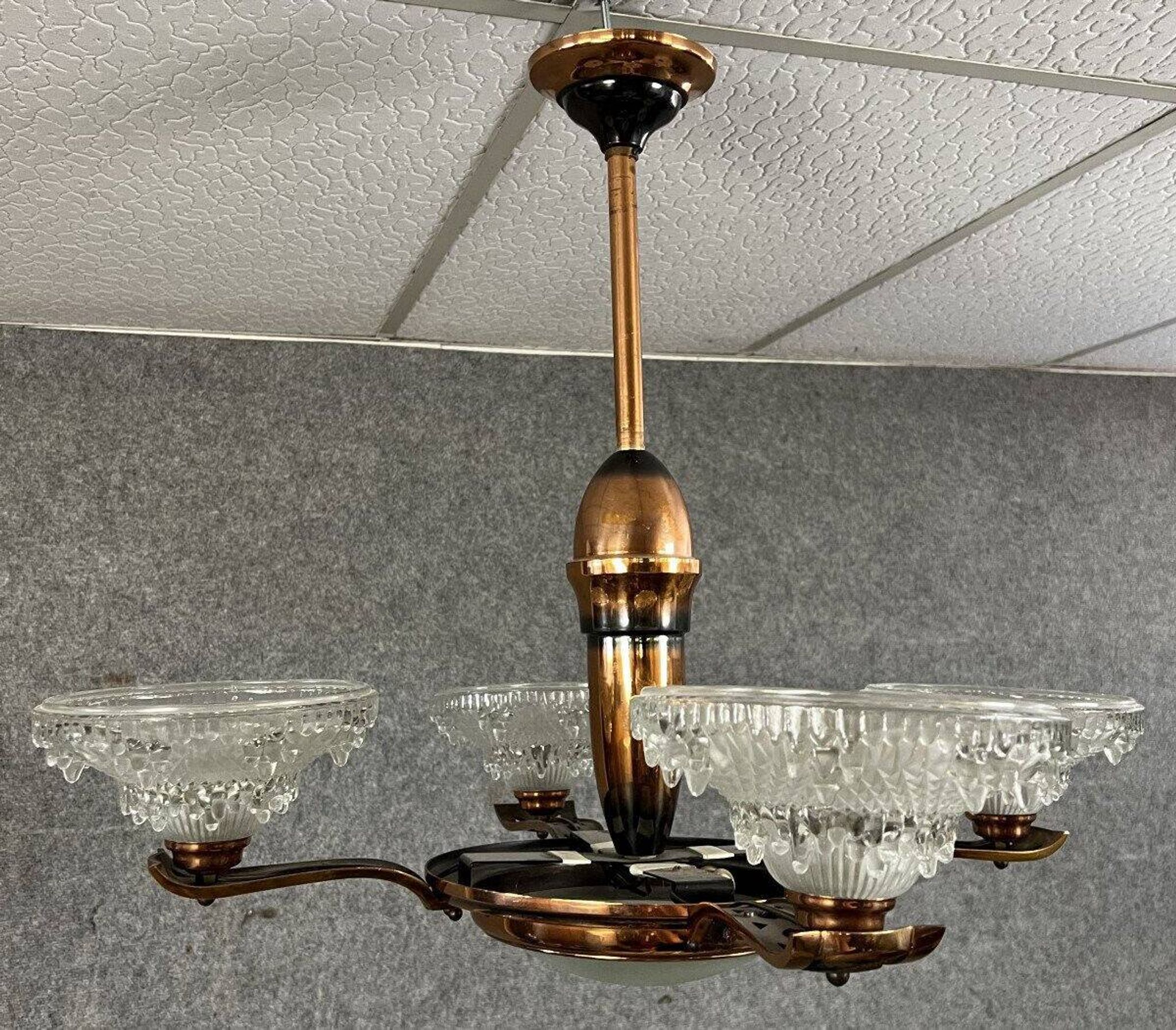 Art Deco period chandelier in copper-plated brass and molded pressed glass, circa 1940