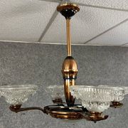 Art Deco period chandelier in copper-plated brass and molded pressed glass, circa 1940