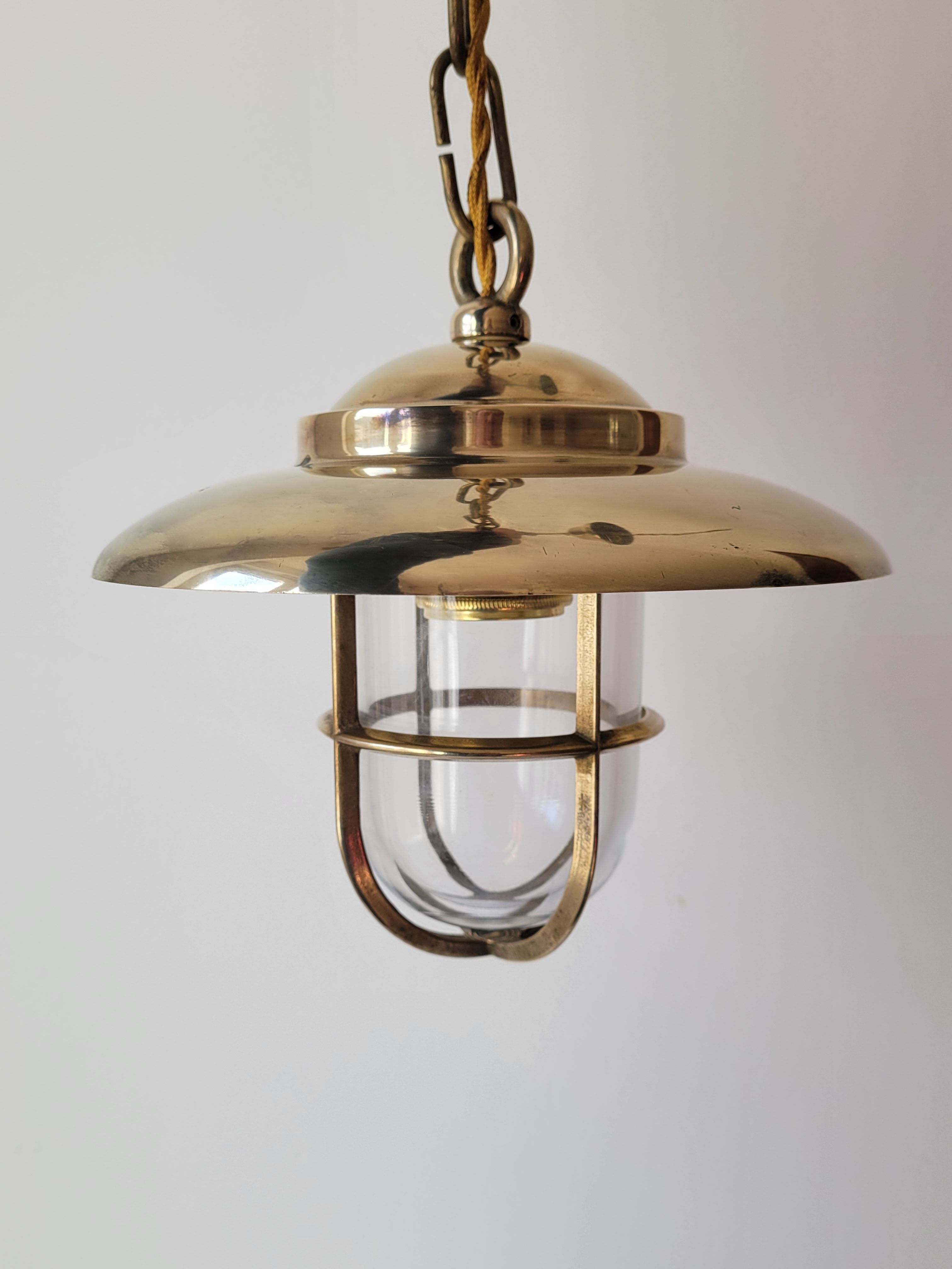 Marine suspension in brass and glass