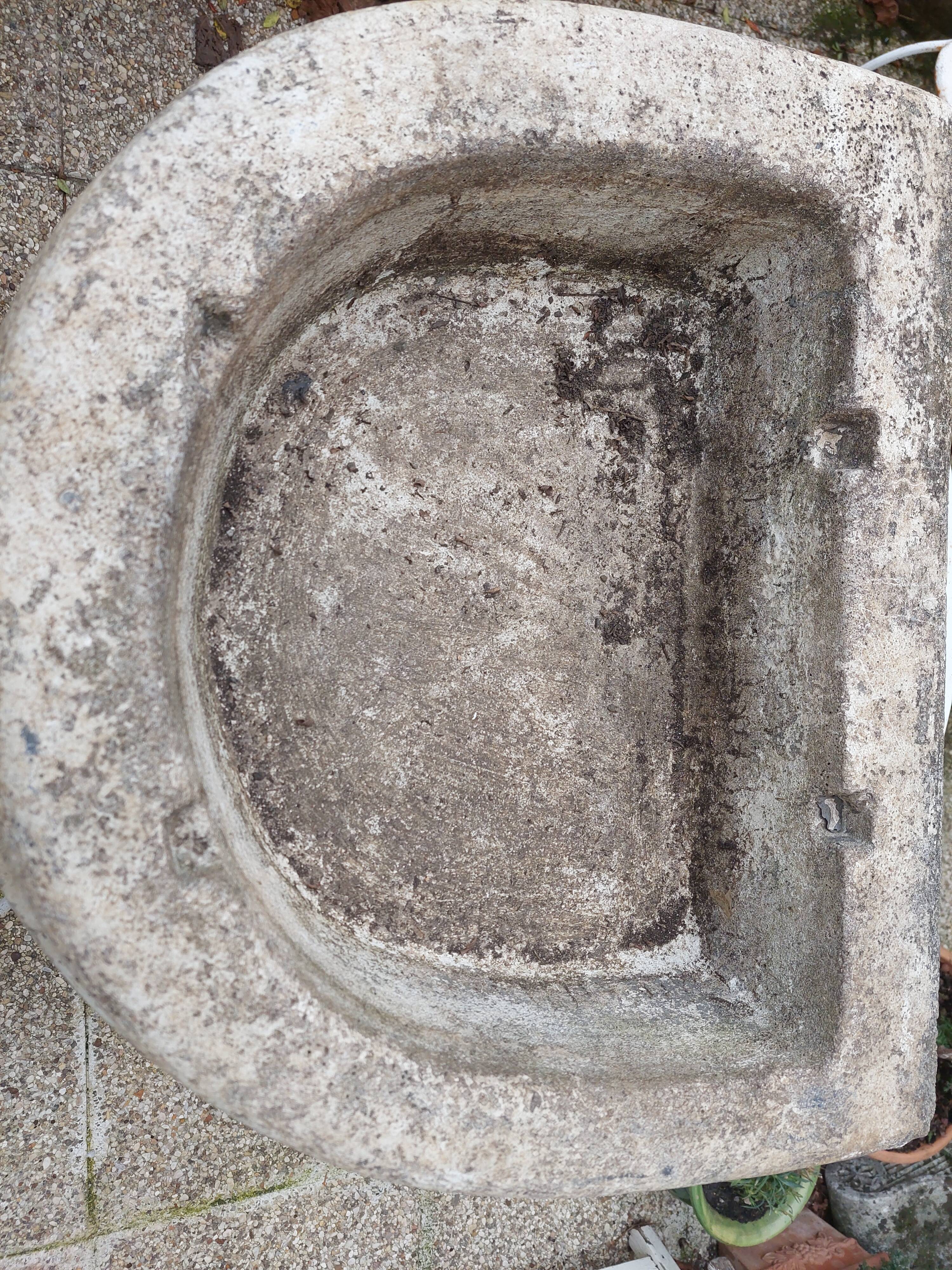 Reconstituted stone sink from the early 20th century.