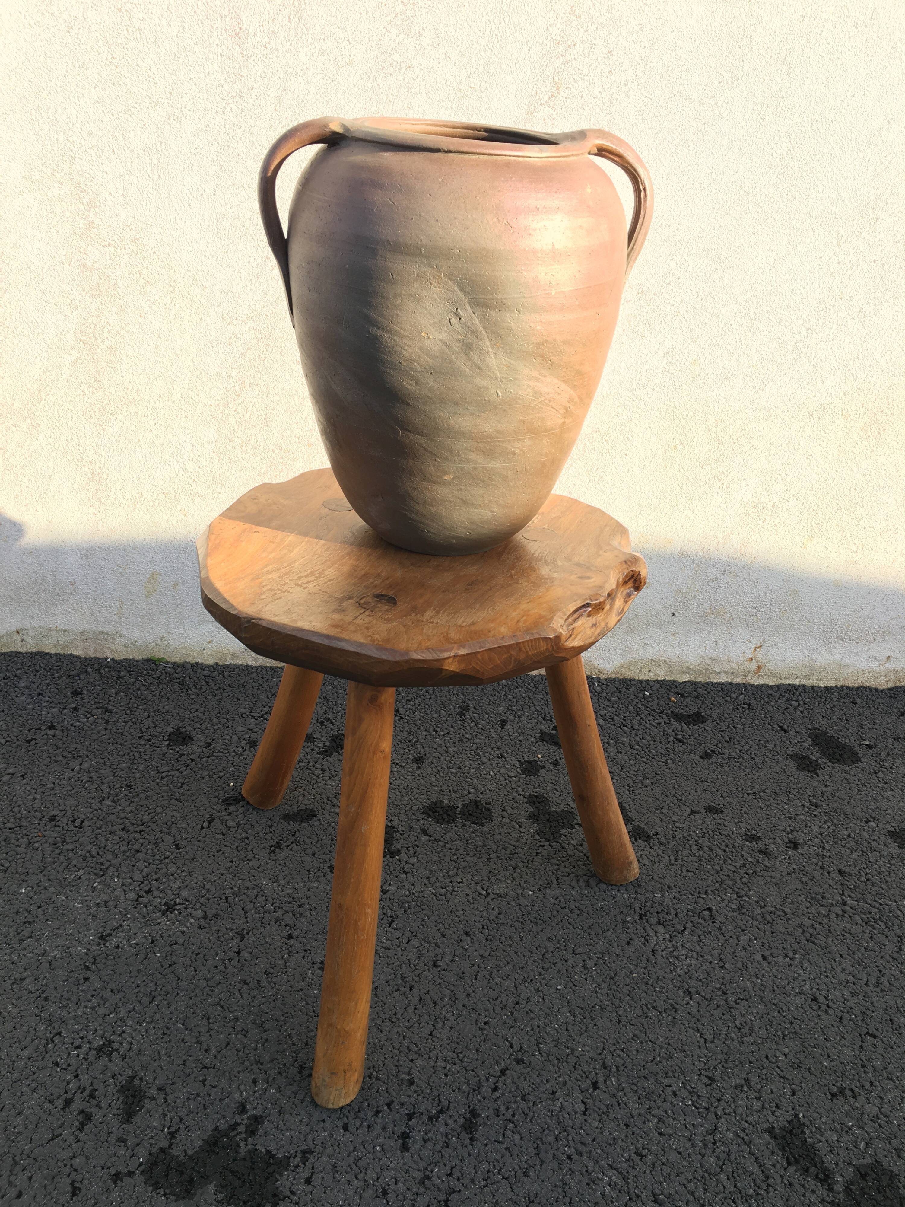 Old jug with two sandstone handles