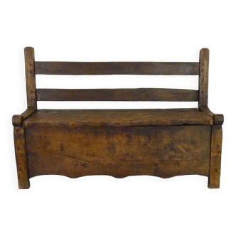 Old chest bench from the 19th century in walnut wood