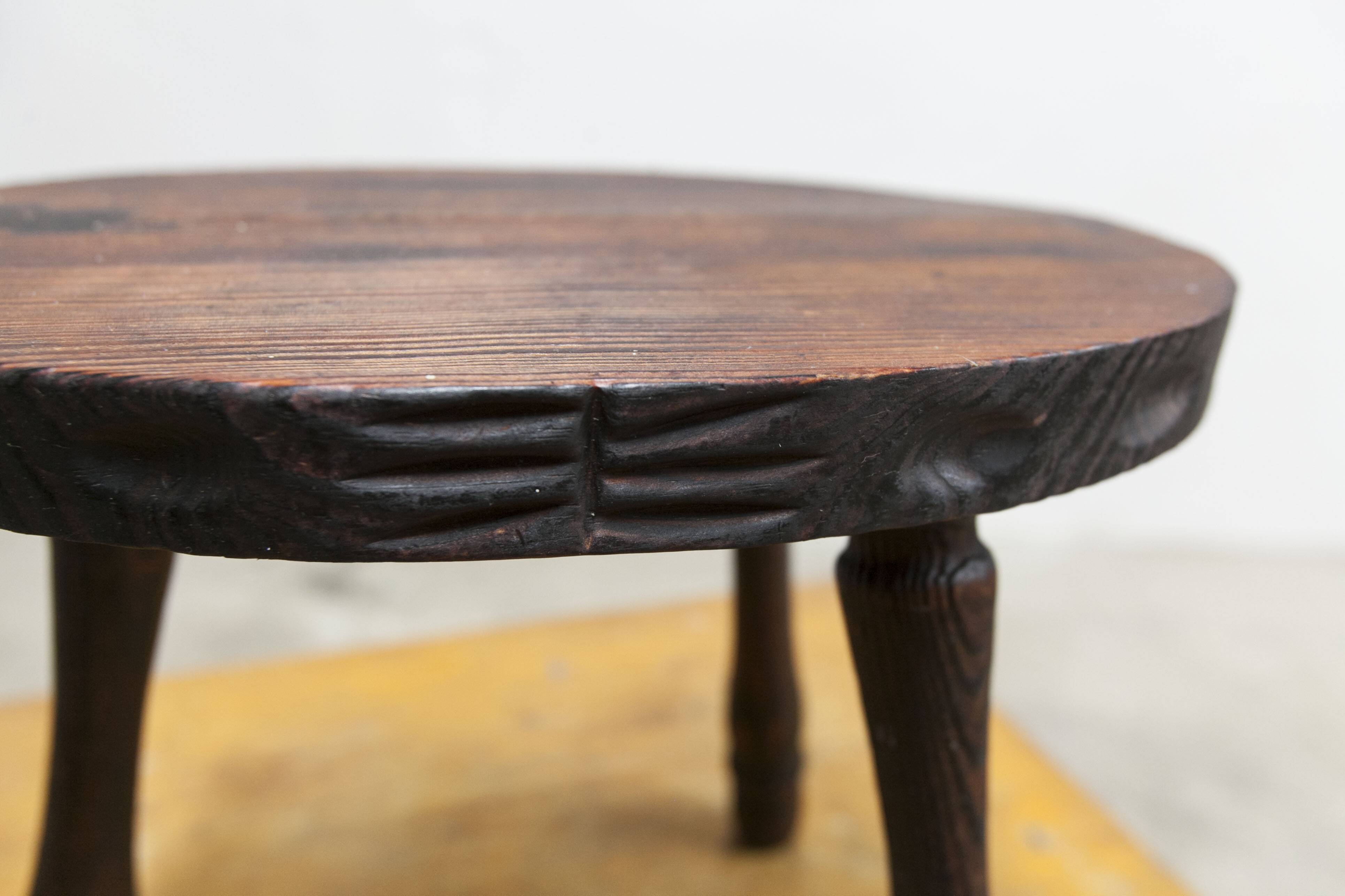 Low brutalist solid wood stool 1950