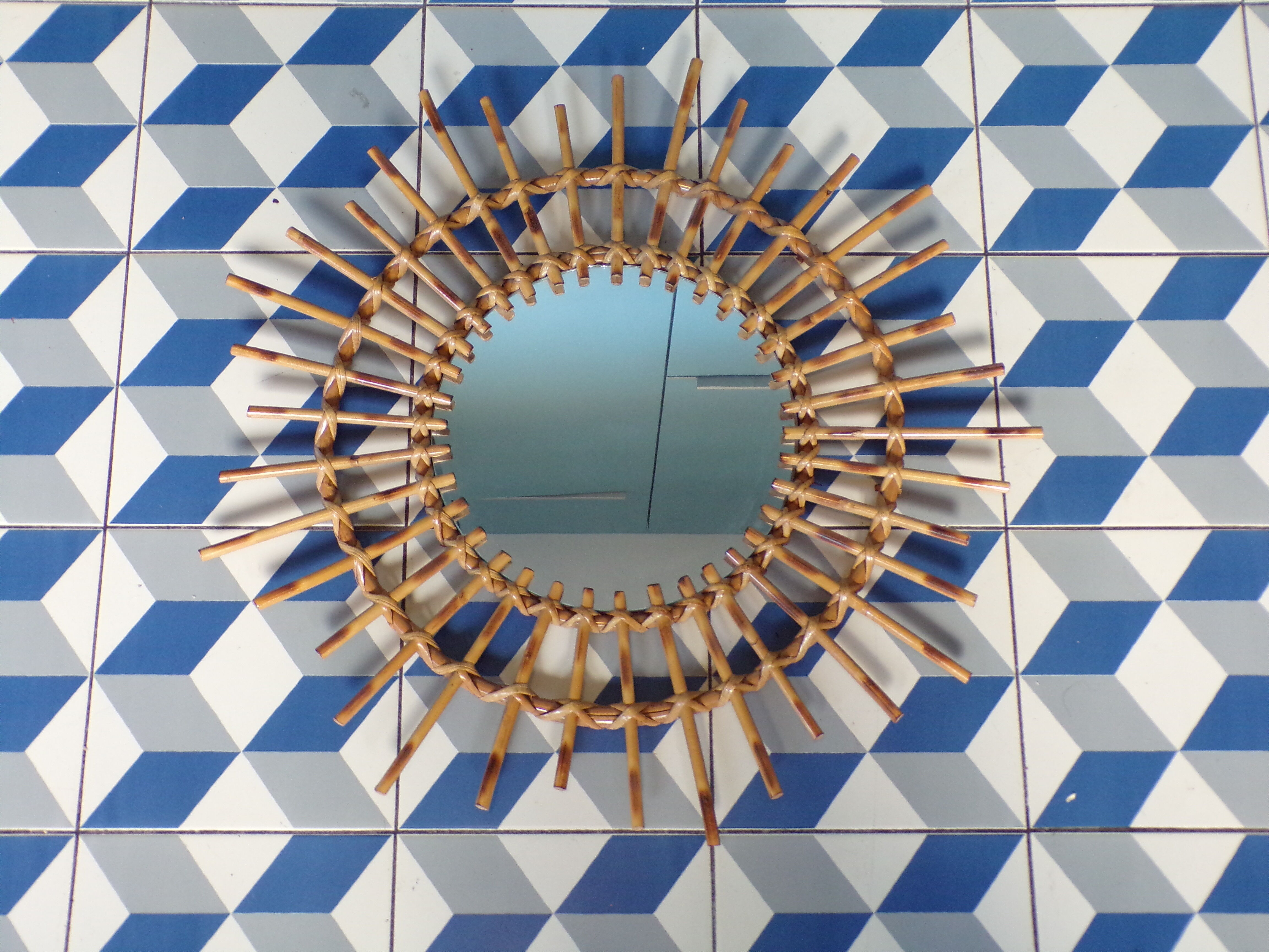 Vintage rattan sun mirror