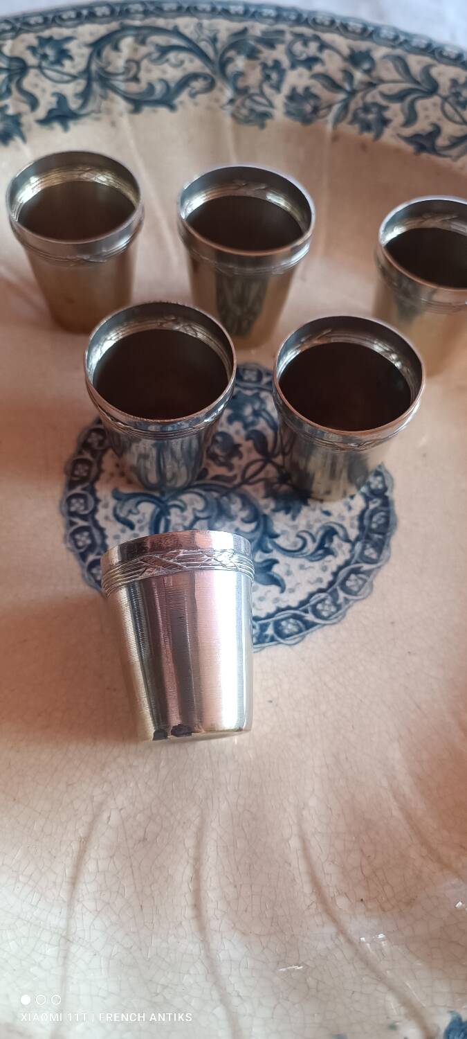 6 silver-plated metal glasses, decorated with a chased ribbon design