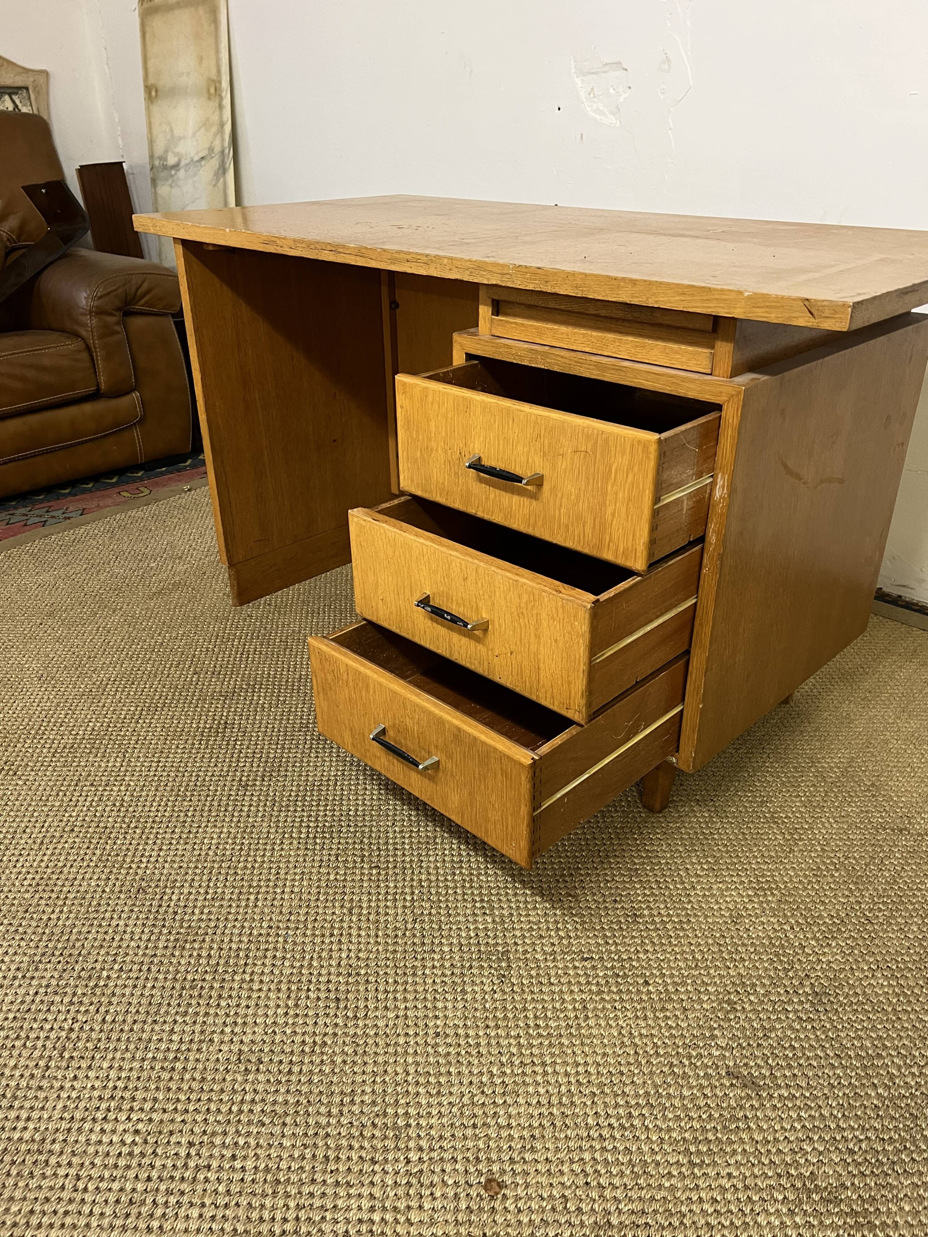 Old wooden desk and armchair
