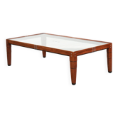 Belle table basse de style Art Déco avec un plateau en verre.