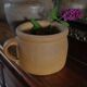 Round terracotta milk jug with handle