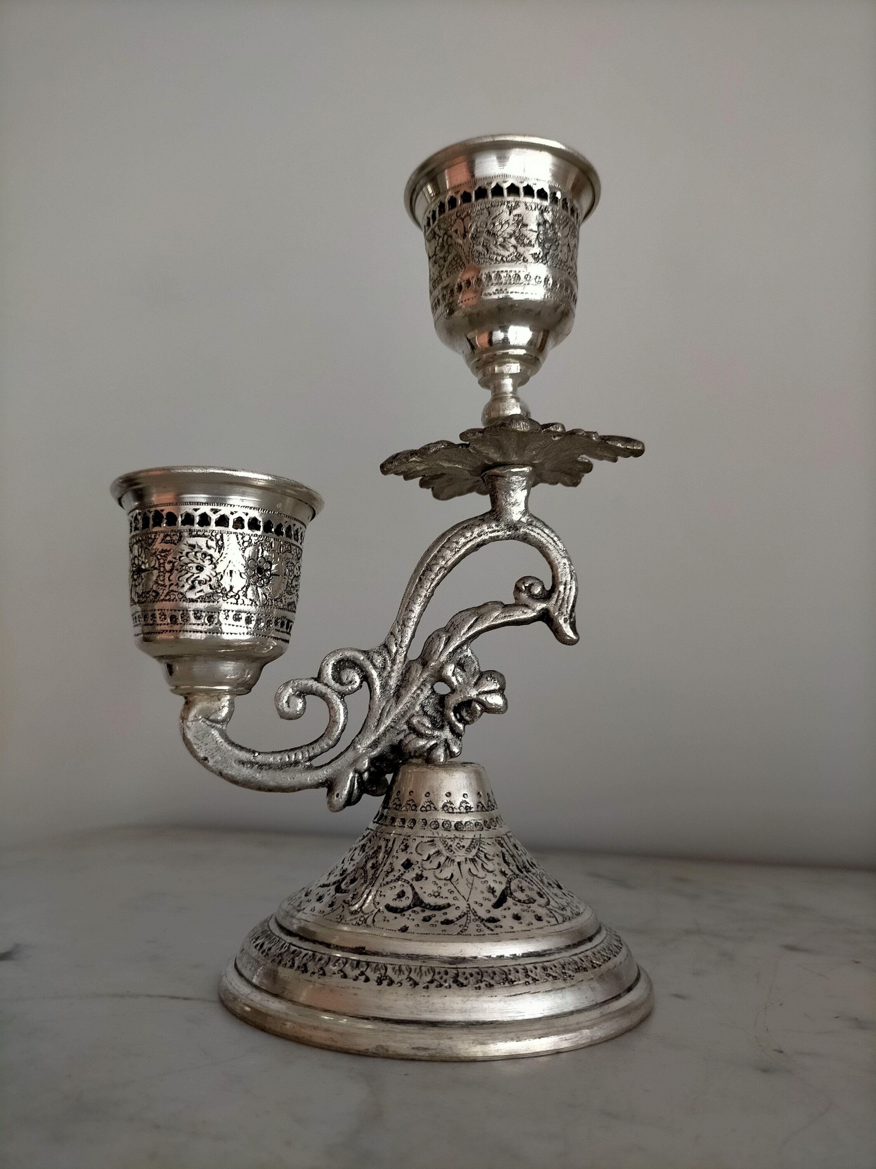 Two-arm metal candlestick