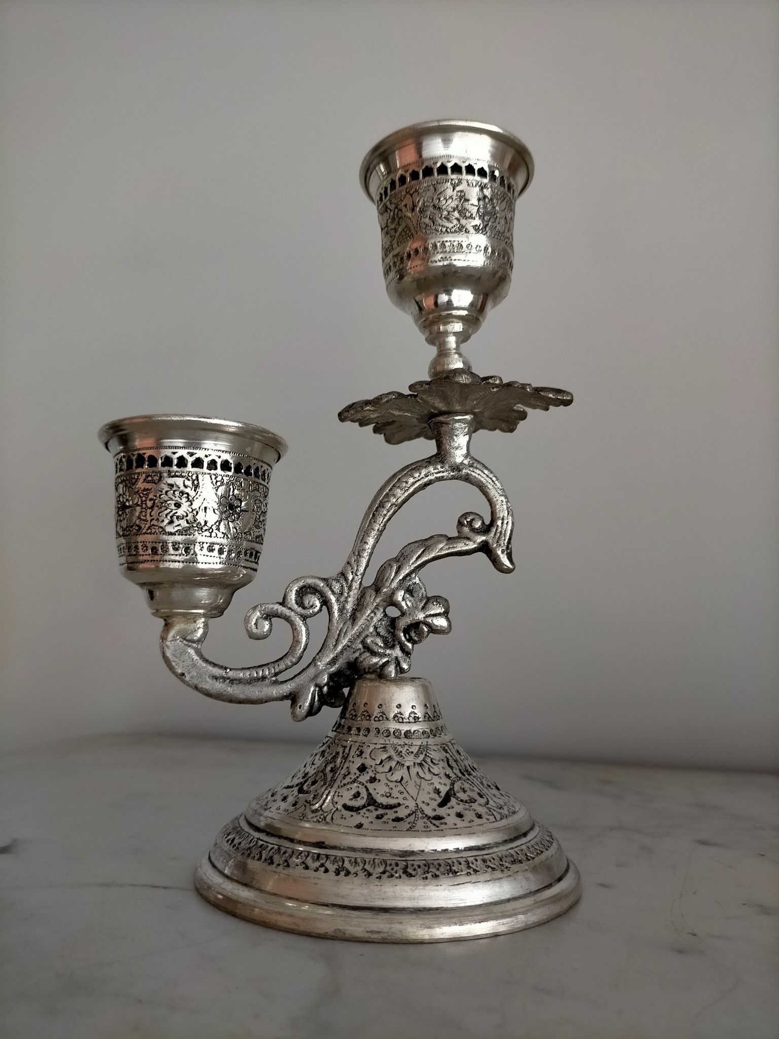 Two-arm metal candlestick