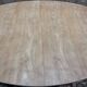 Oval Louis XVI dining table in cherry wood.
