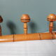 Bamboo-like wall coat rack with 5 mushroom hooks