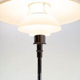 Chrome floor lamp with white lampshade