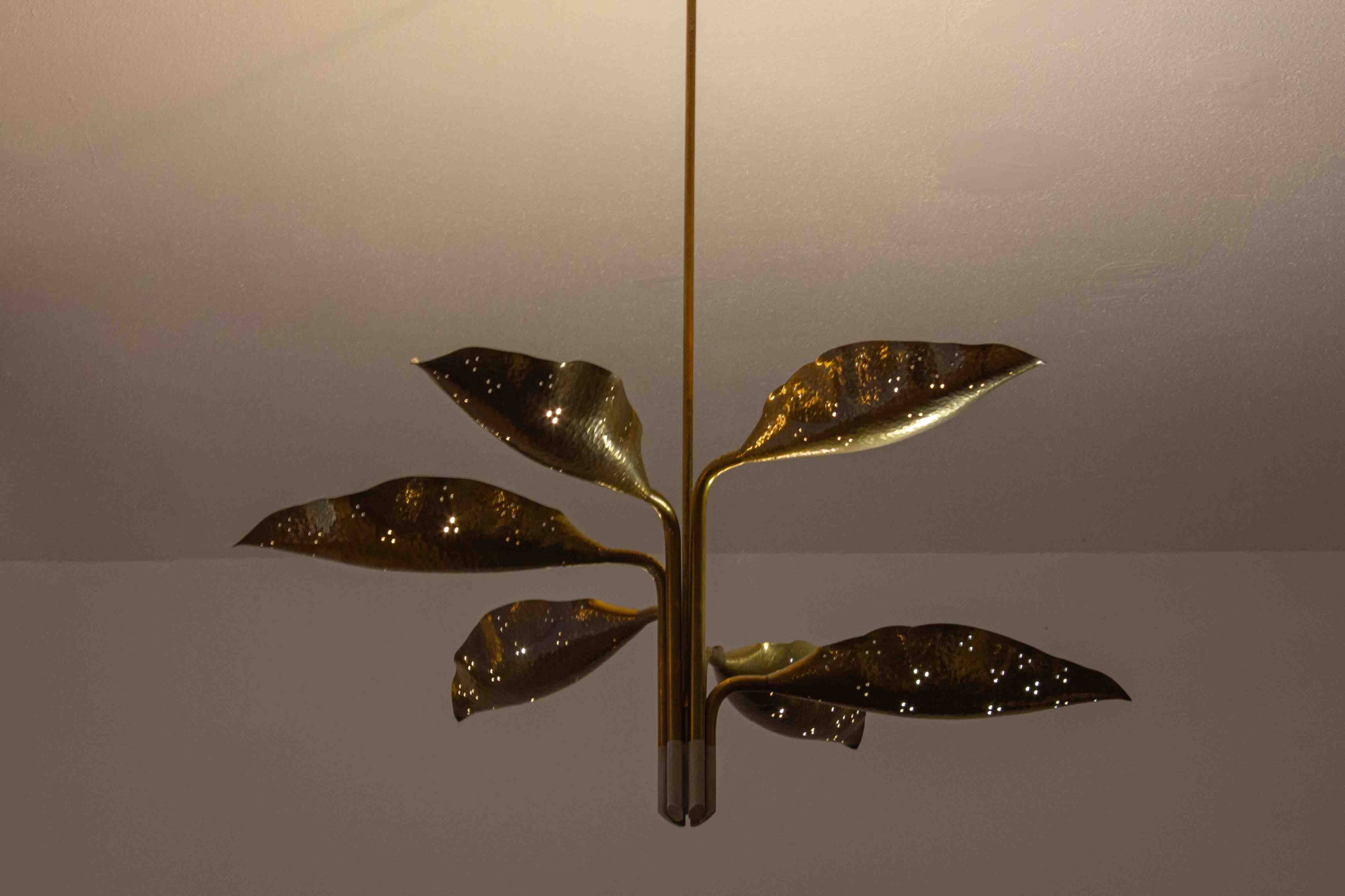 Incredible chandelier with perforated brass leafs by A.  Lelii, Italy 1950s