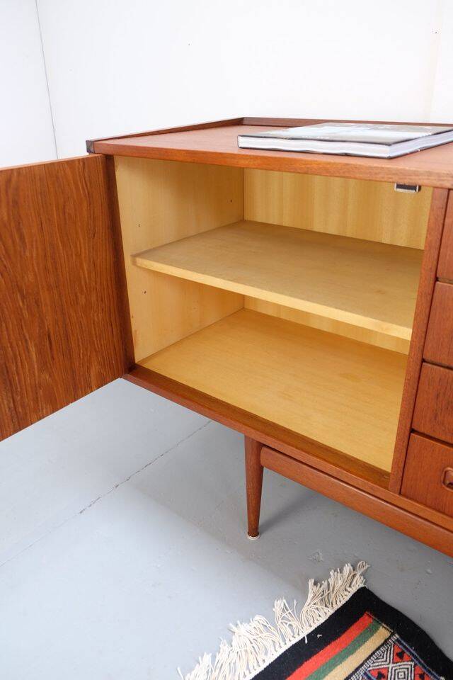 Teak ring buffet in vintage retro style from the 60s-70s.
