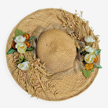Decorative straw hat with dried flowers