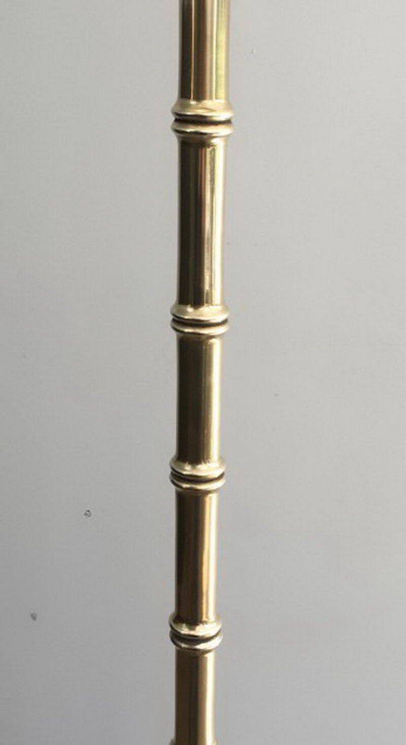 Floor lamp in faux-bamboo style, made of bronze and brass by Jacques Adnet